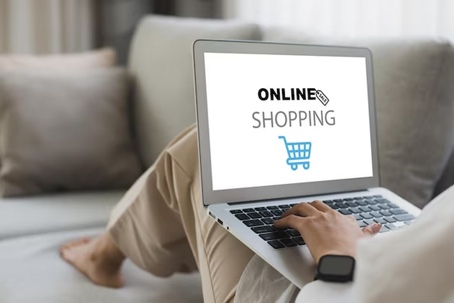 Laptop on lap displaying online shopping